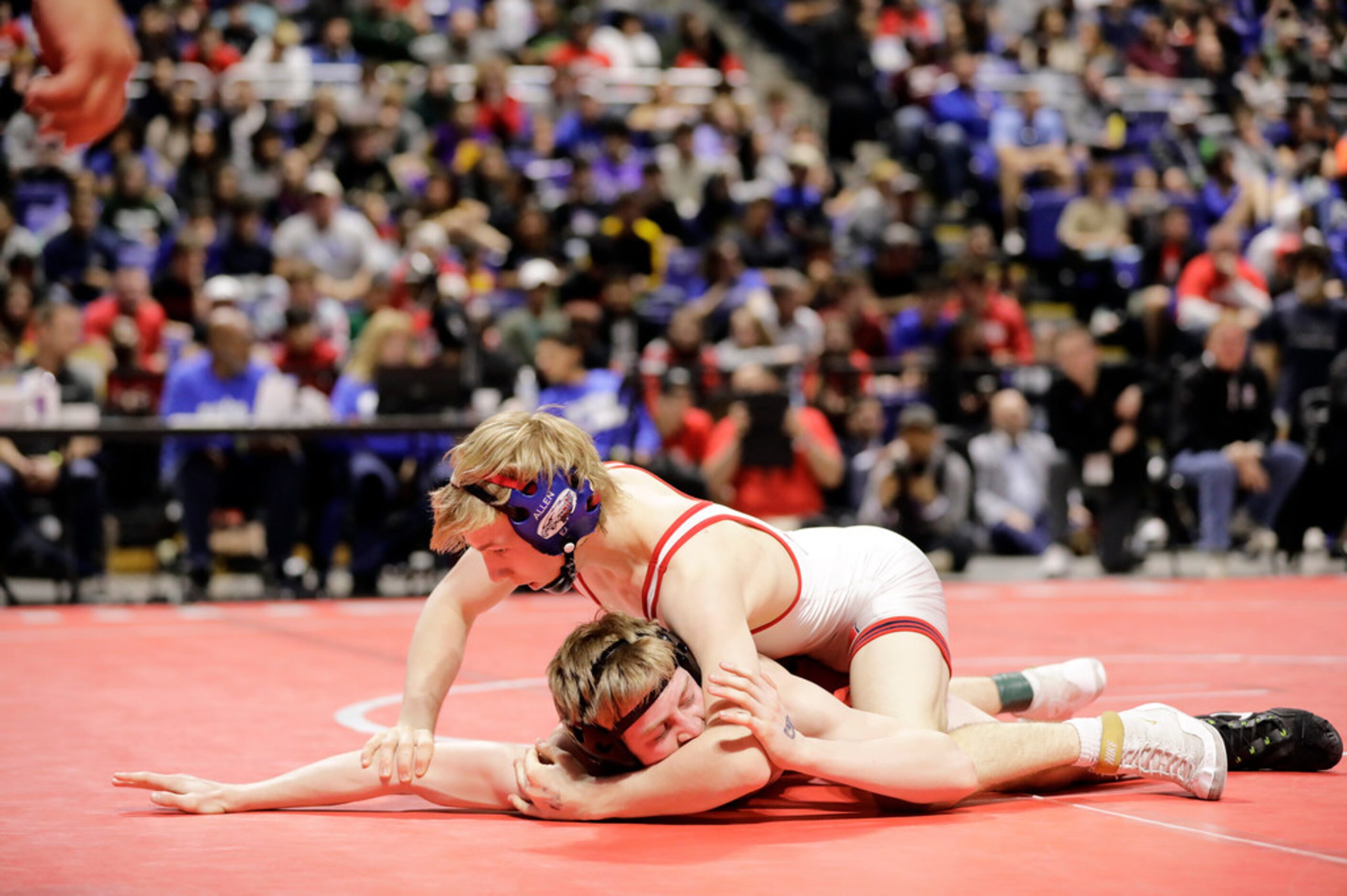 Braxton Brown of Allen wrestles during the UIL Texas State Wrestling Championships,...