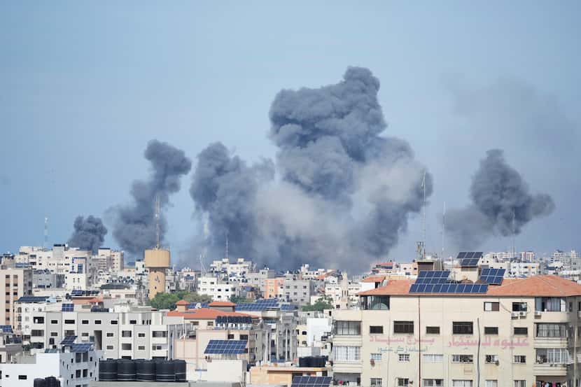Smoke rises from an explosion caused by an Israeli airstrike in the Gaza Strip.