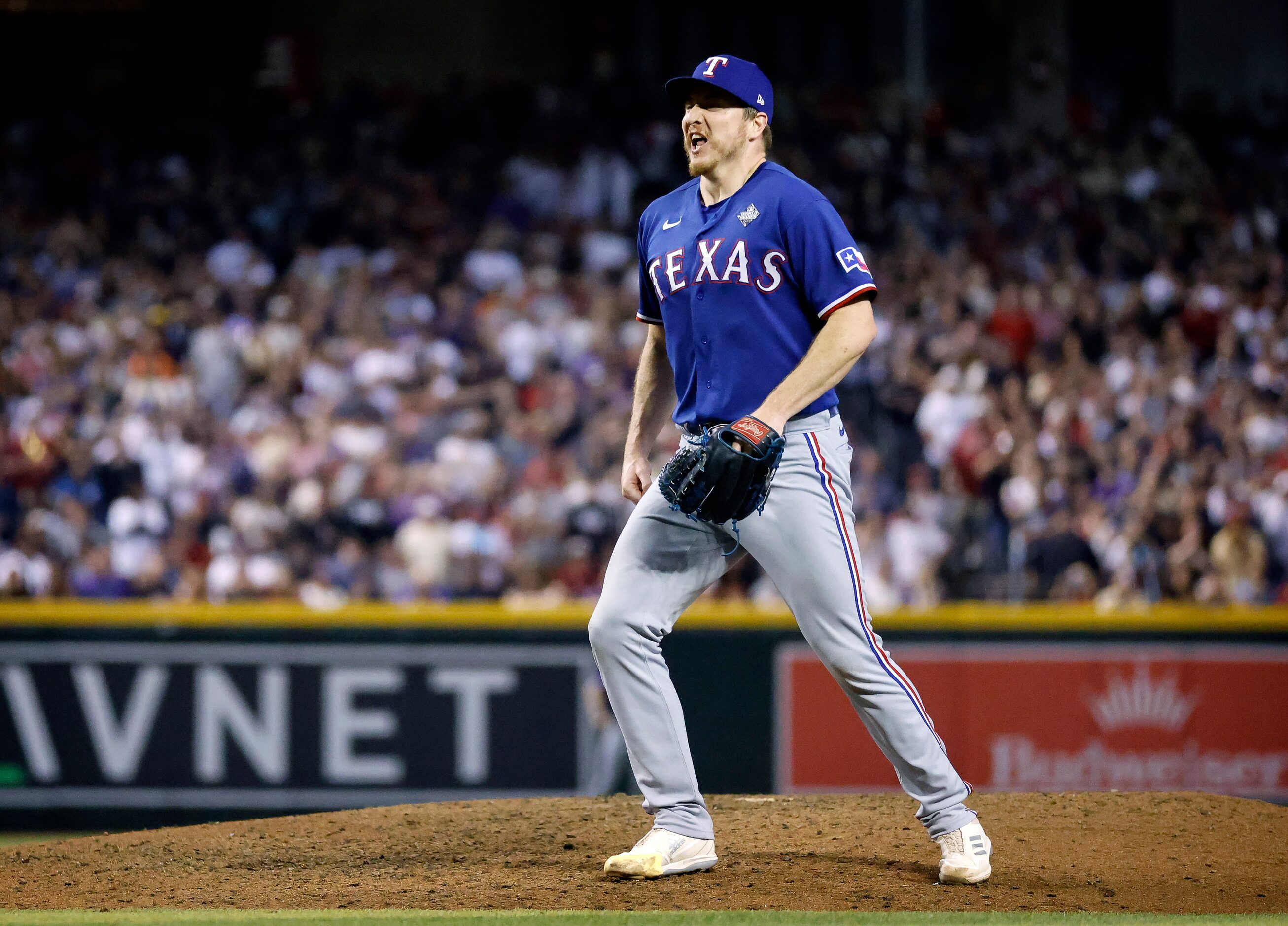 Texas Rangers relief pitcher Josh Sborz (66) reacts after making the final out of Game 5,...