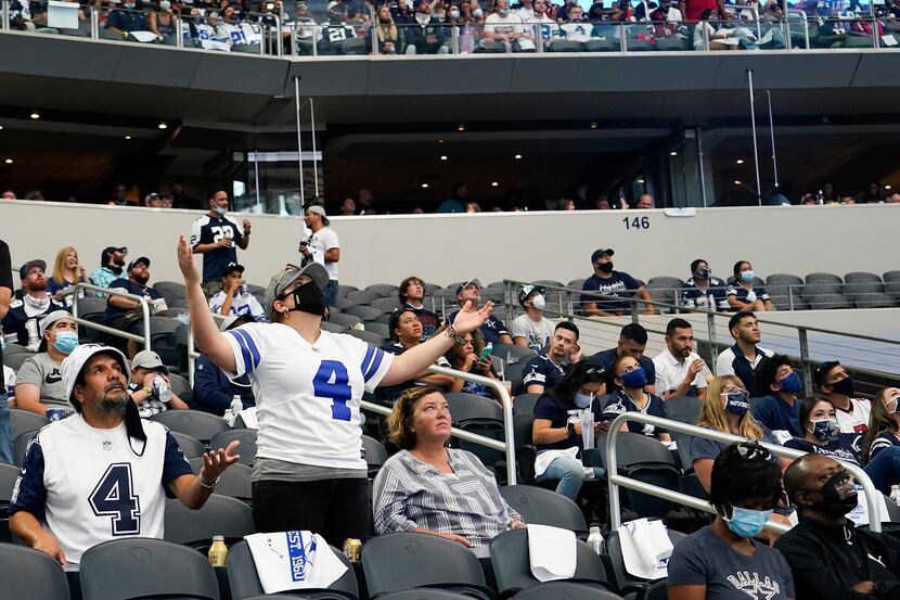 Dallas Cowboys fan reacts after a call went against their team during the second quarter of...