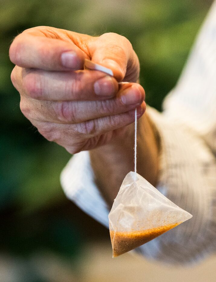 CEO David Meadows of PureWine Inc. holds up a resin bag that was the initial prototype for...