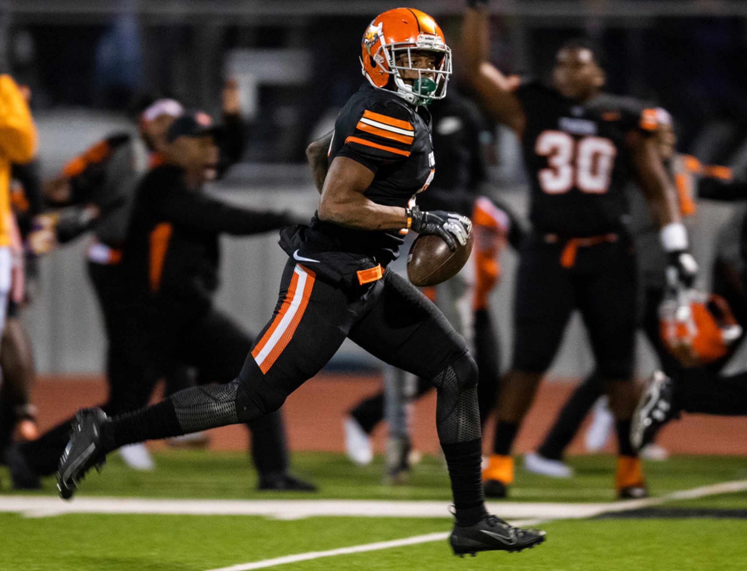 Lancaster running back Tre Bradford (2) runs to the end zone for a touchdown during the...