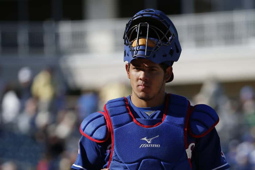 Texas Rangers catcher Jorge Alfaro returns to home plate during a Major League Baseball...