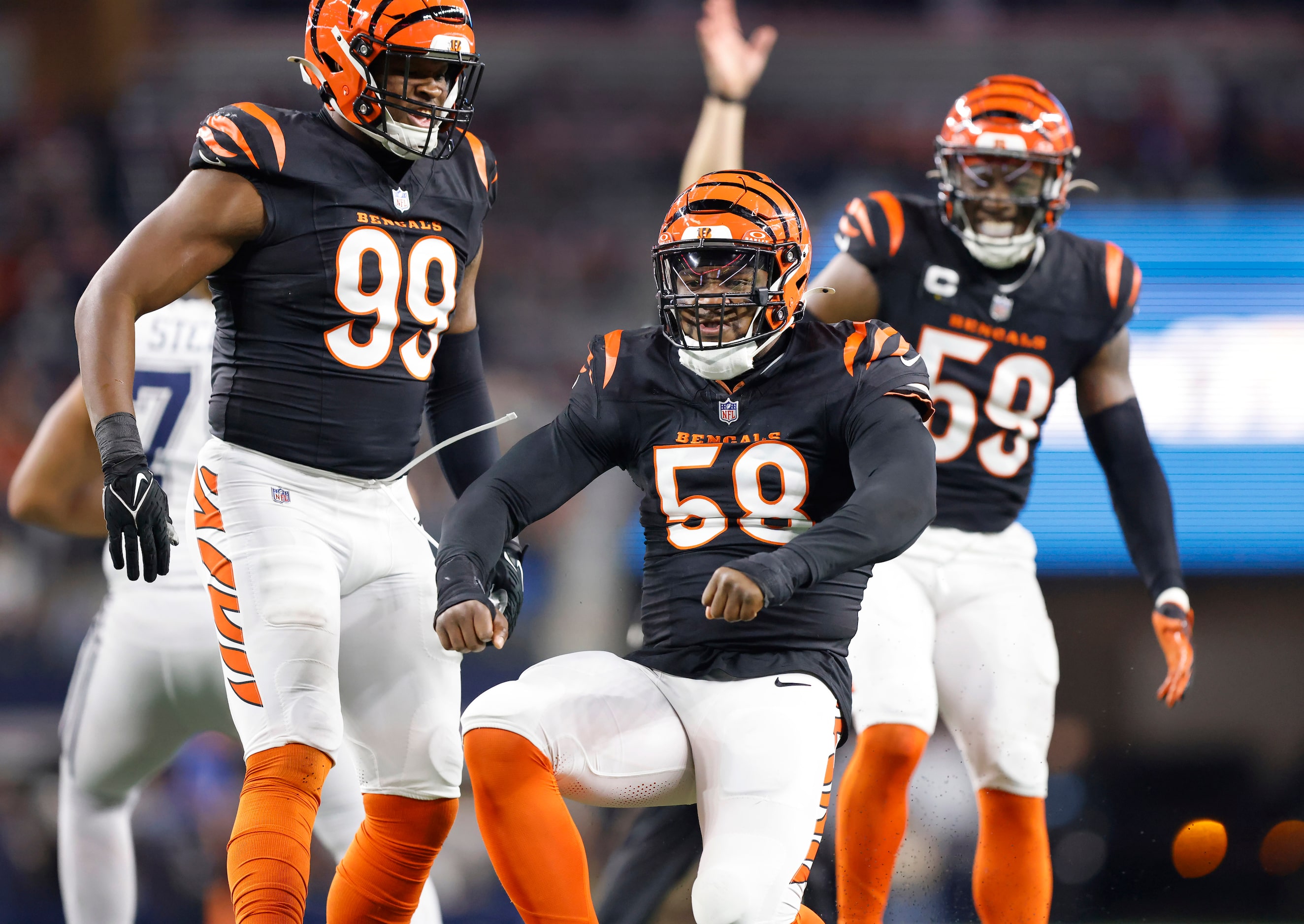 Cincinnati Bengals defensive end Joseph Ossai (58) celebrates his second quarter sack of...