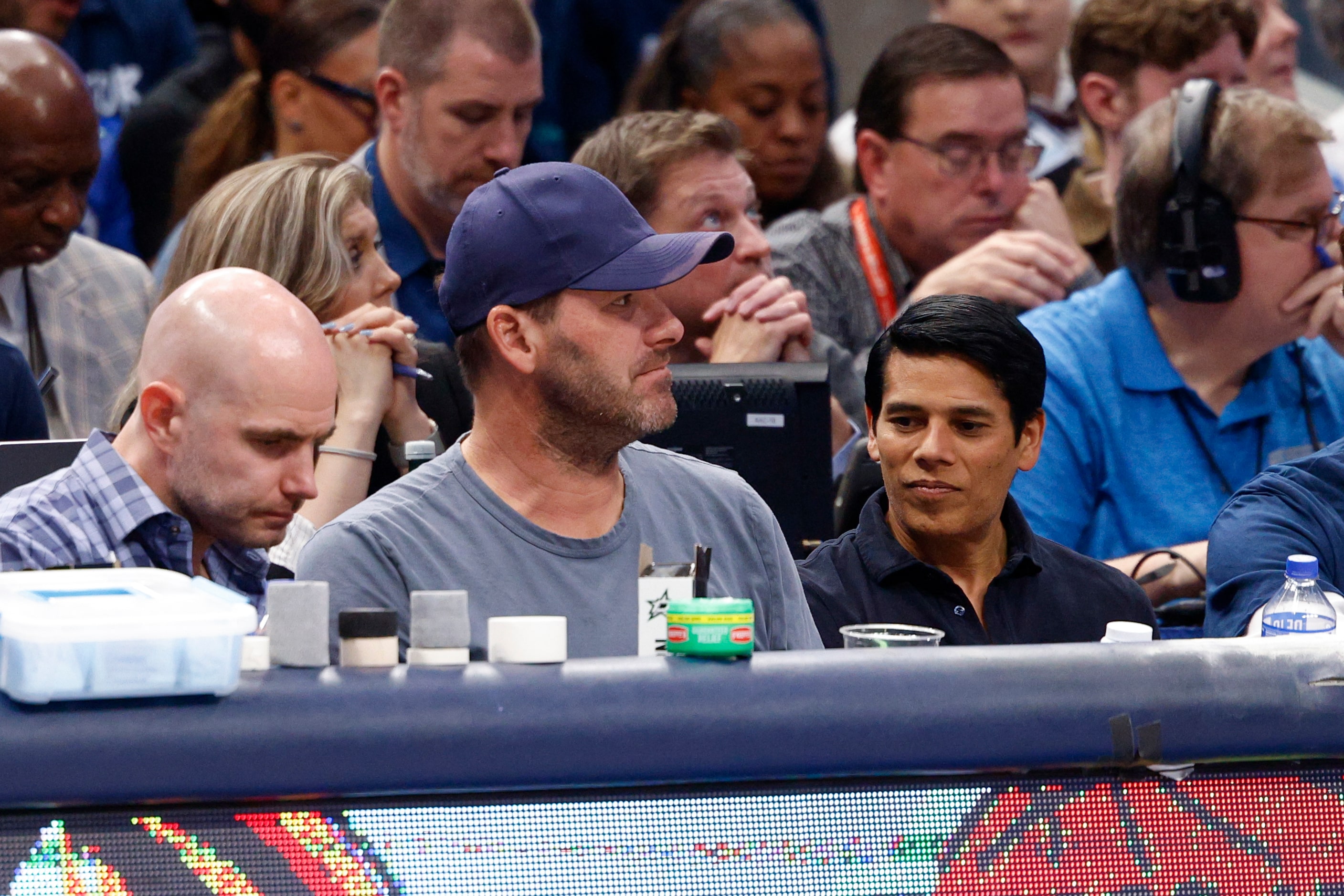 Former Dallas Cowboys quarterback Tony Romo watches the second half of Game 3 of an NBA...