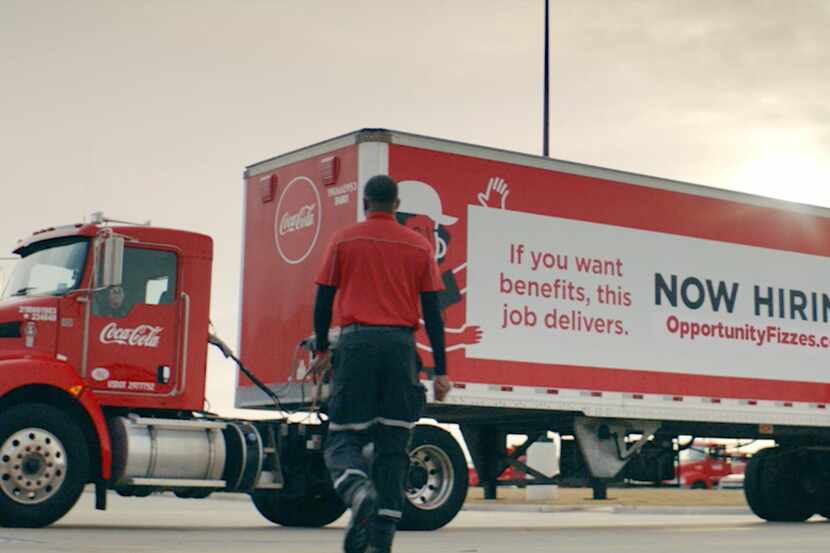 A Coca-Cola Southwest Beverages employee seen in the company's new ad that is part of a...