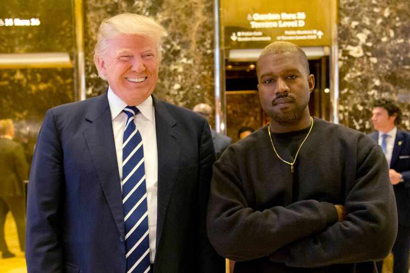 In this Dec. 13, 2016, file photo, President-elect Donald Trump and Kanye West pose for a...