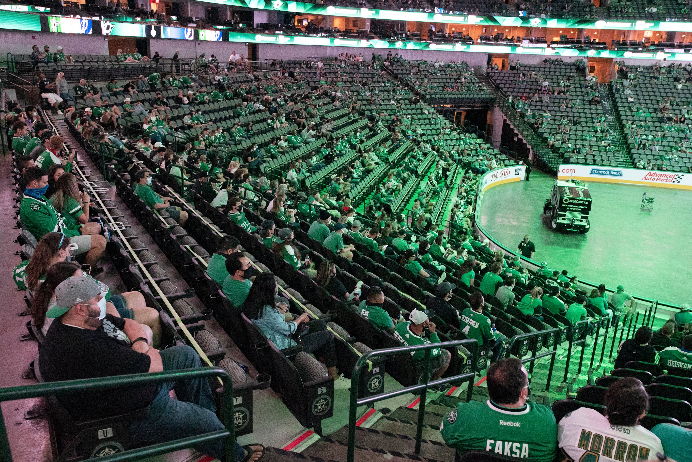 Hockey fans watch the Dallas Stars versus the Tampa Bay Lightning during a watch party at...