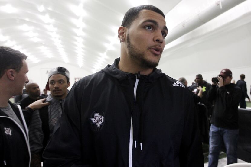 Texas A&M receiver Mike Evans leaves Texas A&M's pro day held Wednesday, March 5, 2014, in...