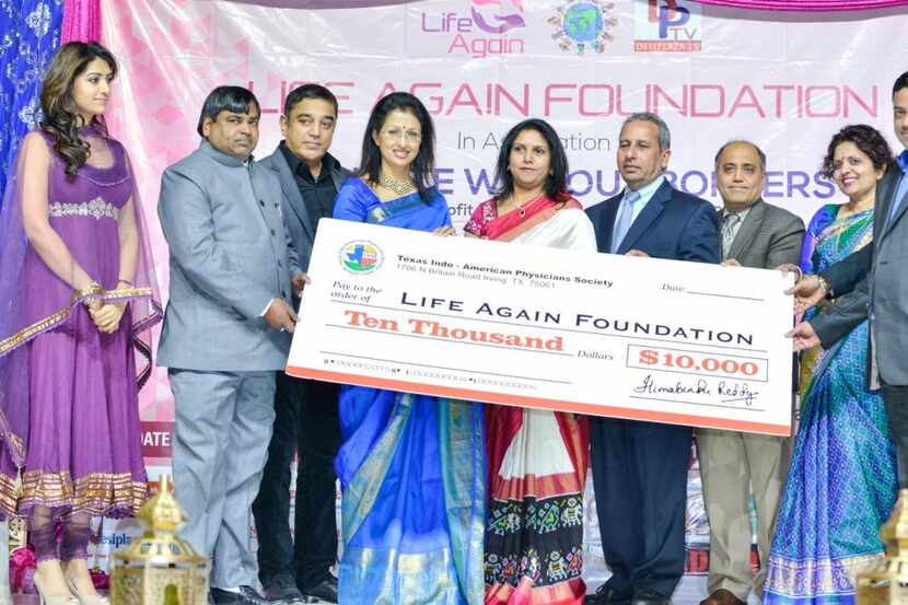 
The Texas Indo-American Physicians Society presented a $10,000 check to Life Again...