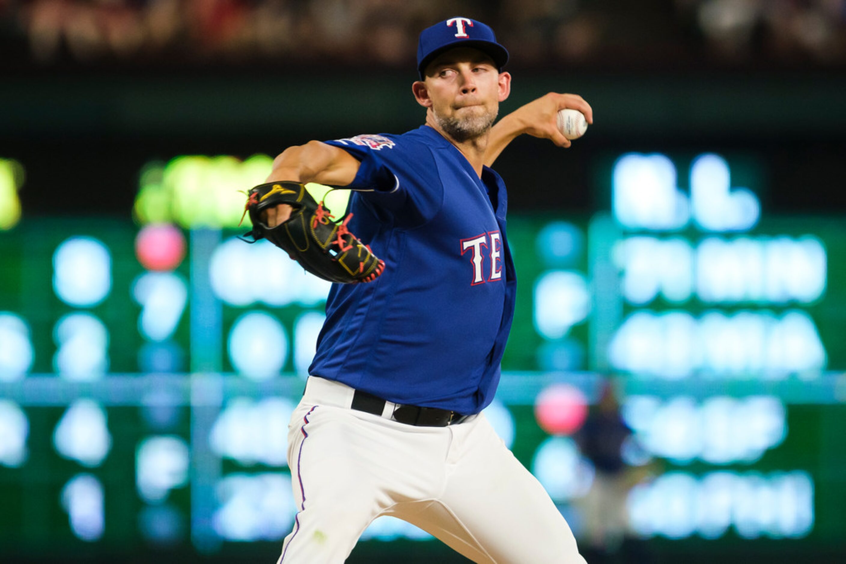 Texas Rangers starting pitcher Mike Minor pitches during the fifth inning against the...