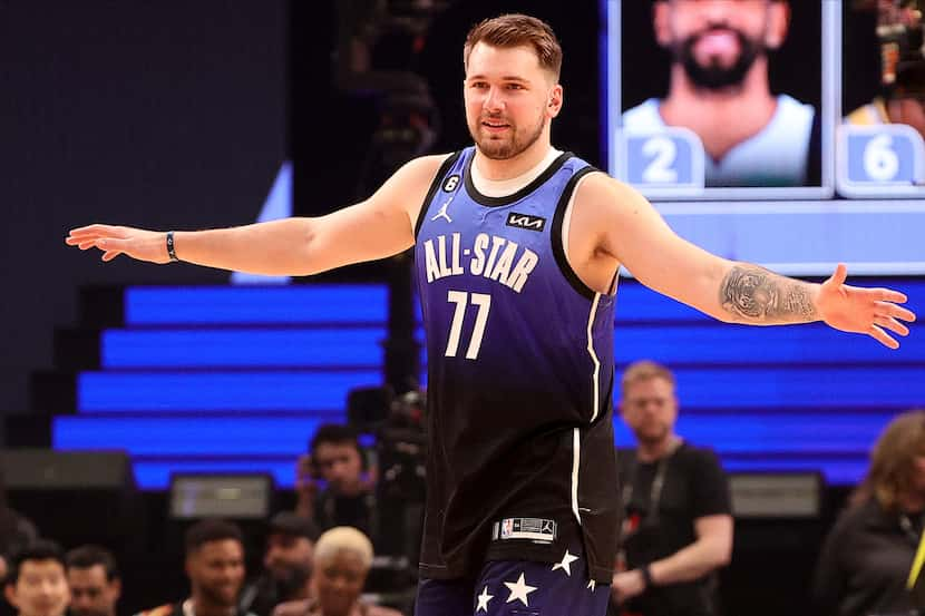 SALT LAKE CITY, UTAH - FEBRUARY 19: Luka Doncic #77 of the Dallas Mavericks reacts during...