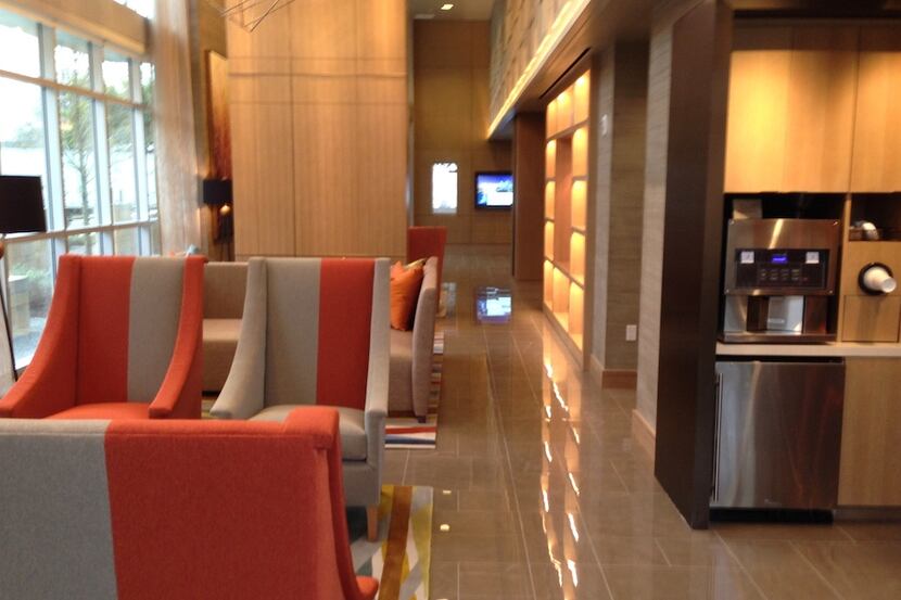  The high-rise on Routh Street has a lobby coffee bar. (Steve Brown/Staff)
