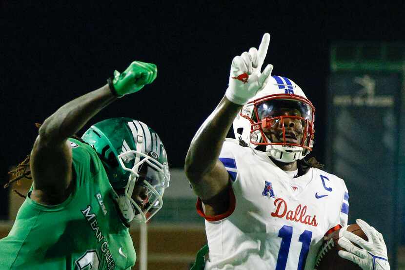 SMU wide receiver Rashee Rice (11) celebrates a touchdown catch in the end zone ahead of UNT...