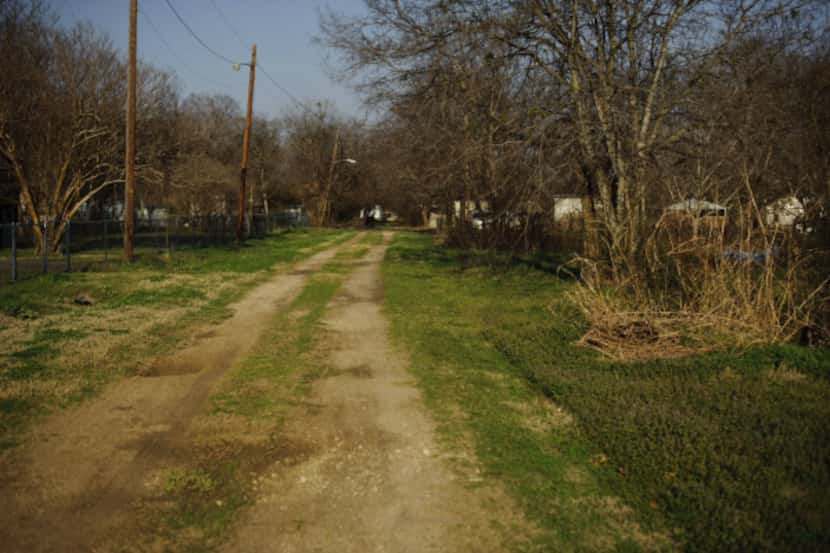 A back alley in Kemp, a rural area of Kaufman County where an isolated Mennonite cabinet...