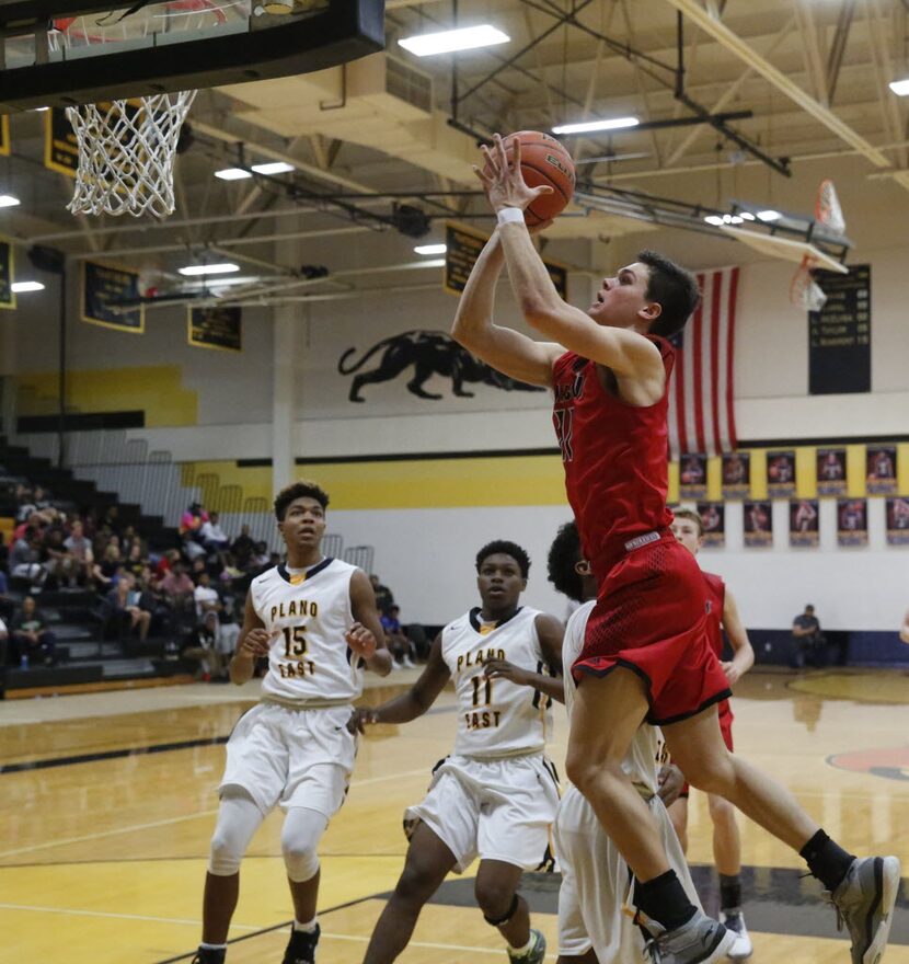 Flower Mound Marcus Jake Watermiller, #11, goes up against Plano East in District 6-6A boys...