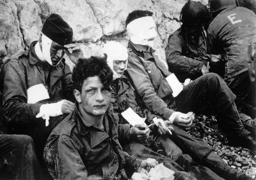 American troops of the 16th Infantry Regiment, injured while stormingOmaha Beach during the...