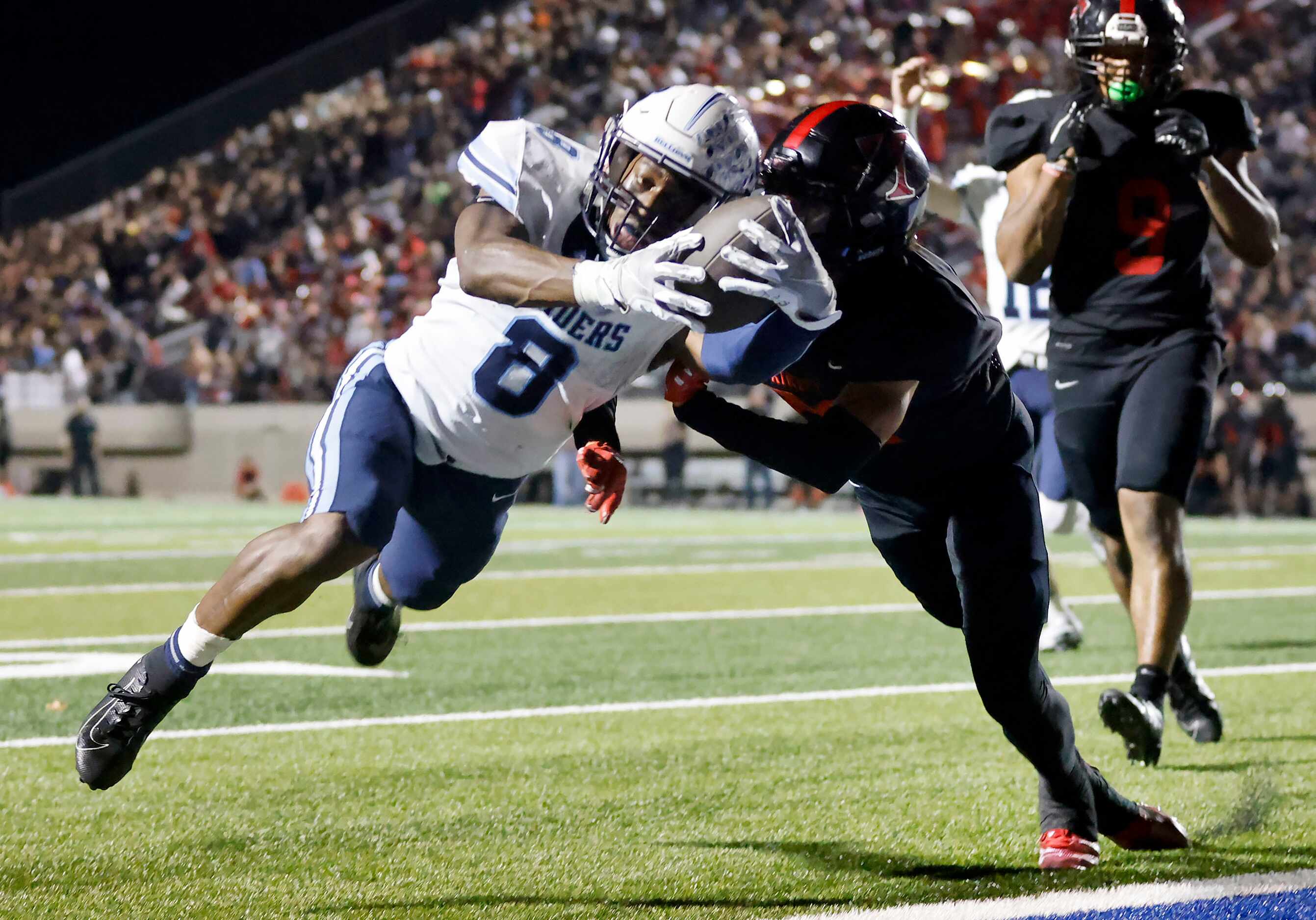 Hurst L.D. Bell running back Gracien Anto (8) dives for a would be touchdown in the fourth...