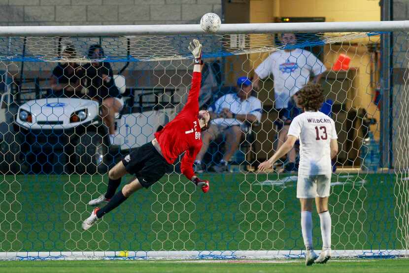 Plano goalkeeper Henry Huffstetler (1) makes a leaping saving during the second half of the...