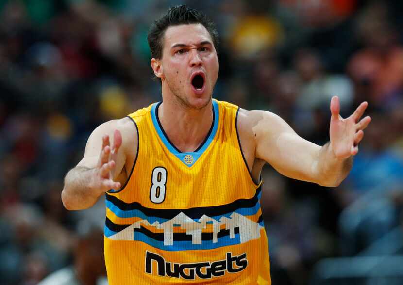 Denver Nuggets forward Danilo Gallinari, of Italy, argues after he was called for a foul...