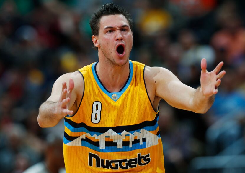 Denver Nuggets forward Danilo Gallinari, of Italy, argues after he was called for a foul...