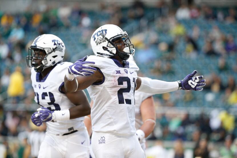 TCU Horned Frogs running back Kyle Hicks (21) celebrates scoring a touchdown against Baylor...