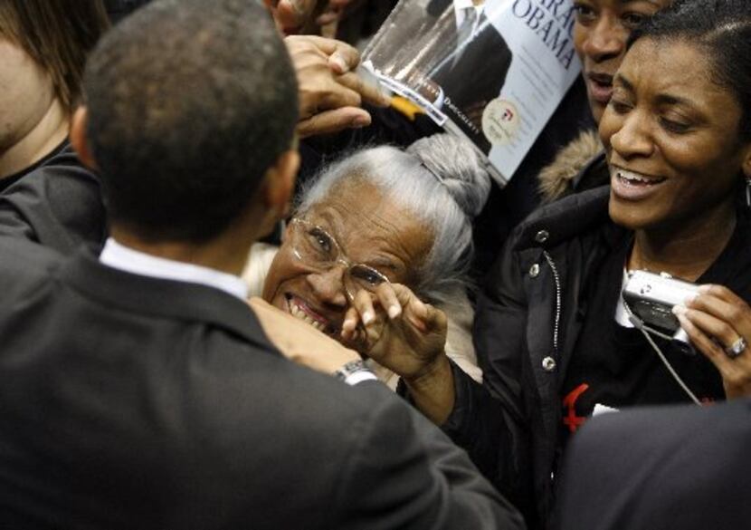 Fans get a chance to get close to Sen. Barack Obama after a speech at a rally at Reunion...