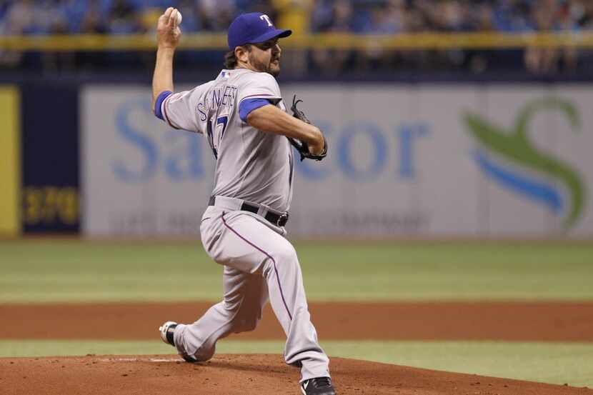 ST. PETERSBURG, FL - APRIL 4: Joe Saunders of the Texas Rangers pitches during the first...