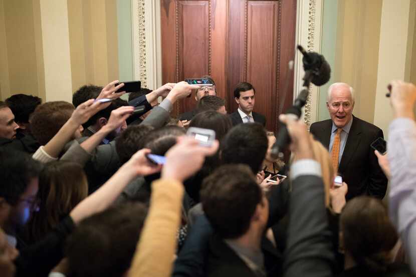 Sen. John Cornyn speaks to reporters on Capitol Hill in Washington on Friday as the Senate...