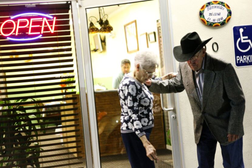 Amelia and Ray Perry, married for 64 years,  help each other as they leave leave Mi Familia...