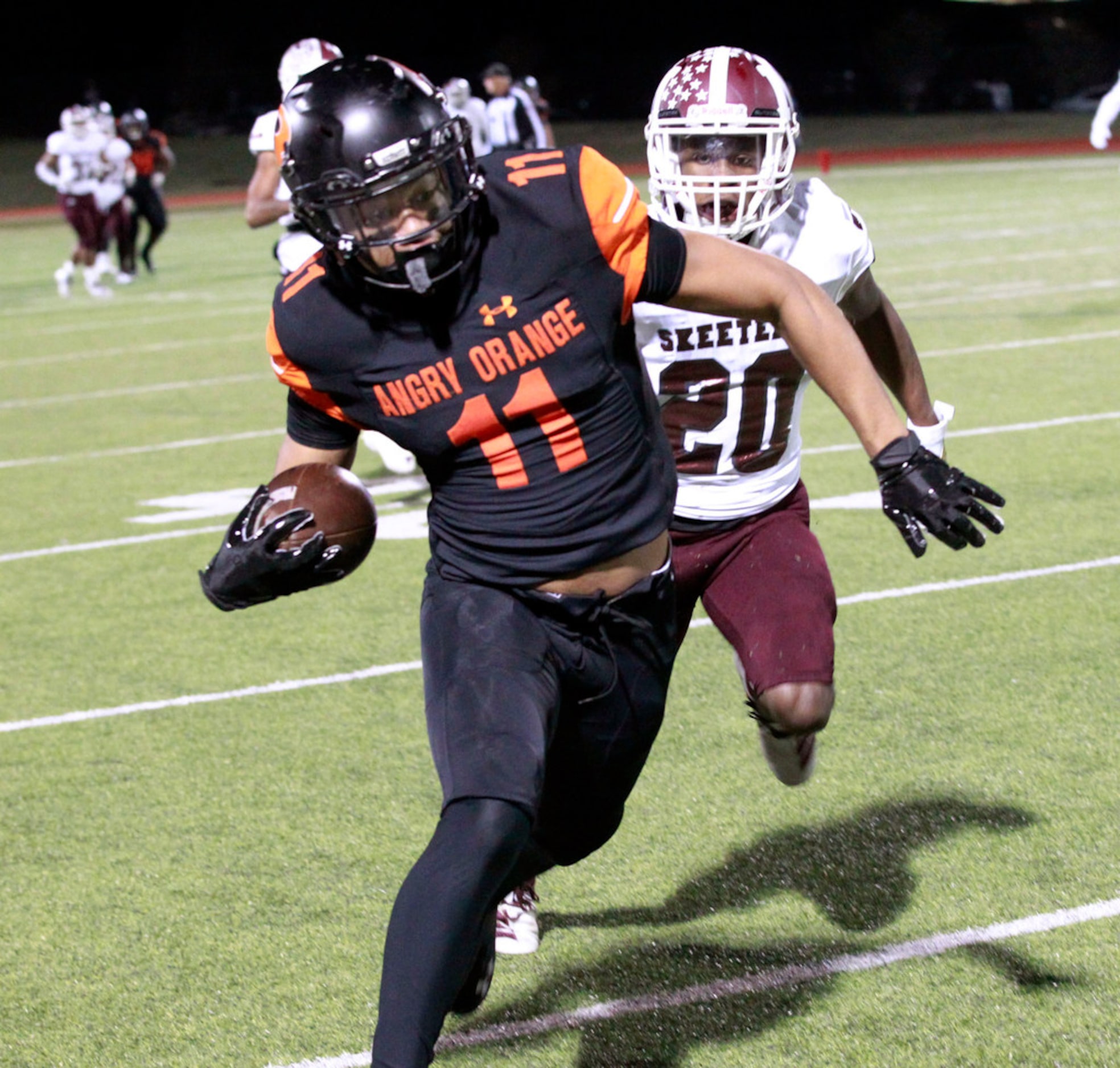 Rockwall High Jaxon Smith-Njigba (11) takes the ball deep into Mesquite territory, as...