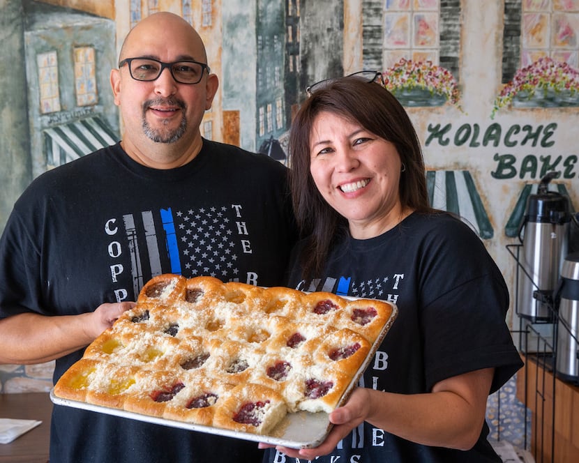 Kasa Kolache bakery owners Enrique Barrera (left) and Gloria Barrera pose for a portrait in...