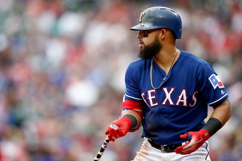 Texas Rangers' Rougned Odor bats against the Houston Astros in a baseball game Sunday, April...