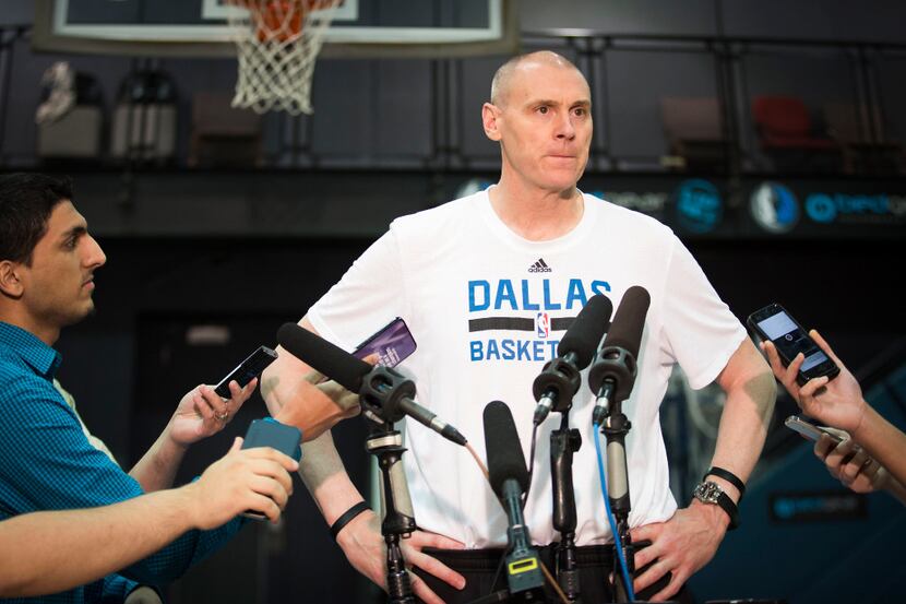 Dallas Mavericks head coach Rick Carlisle addresses the media as the Mavericks conduct exit...