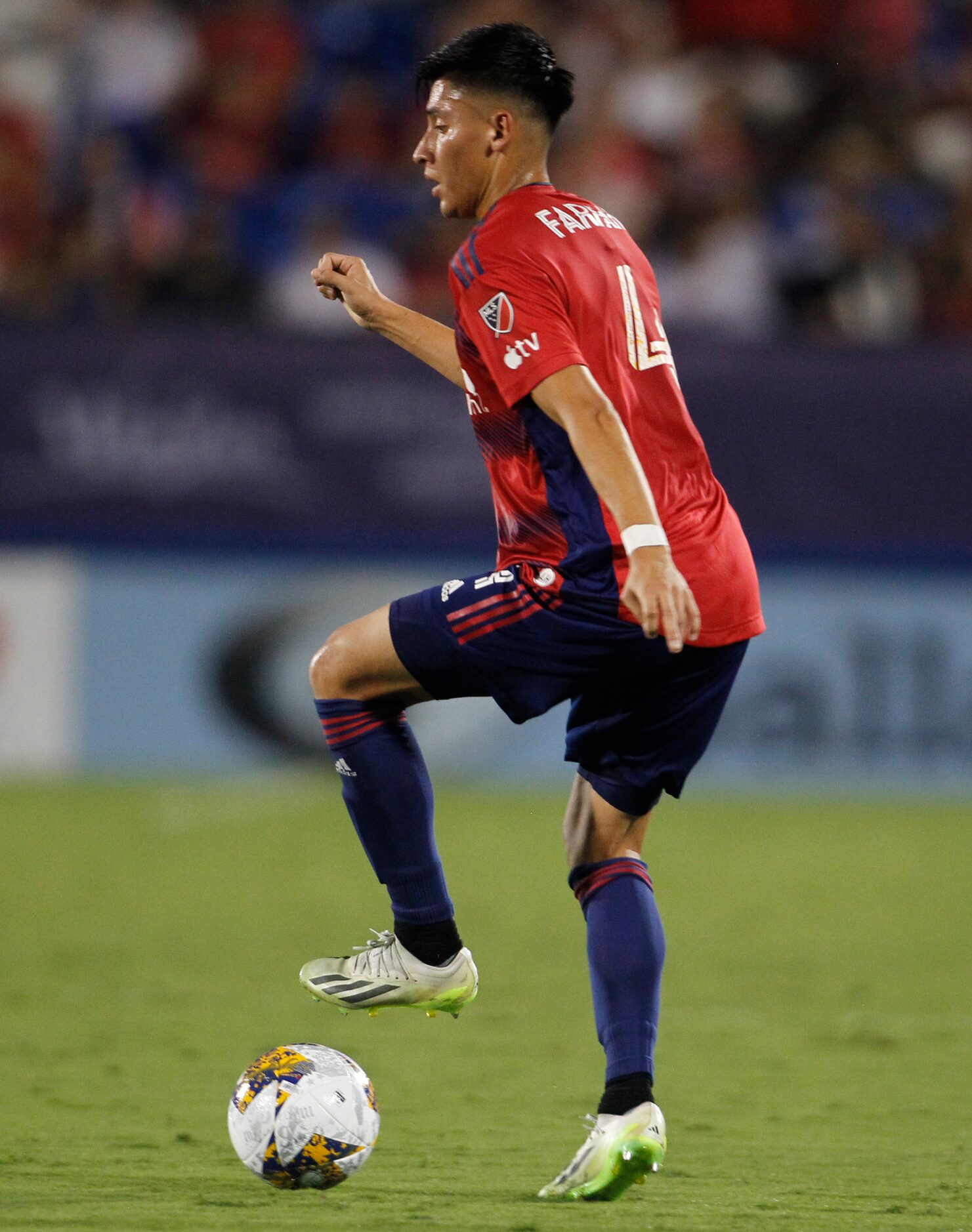 FC Dallas defender Marco Farfan (4) looks to pass during first half play against Columbus....