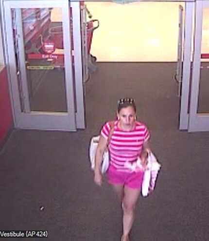 Police say this woman stole credit cards from multiple vehicles July 13.
