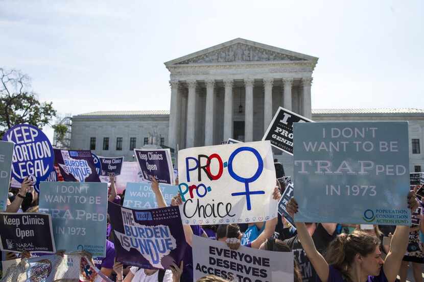 Demonstrators rallied outside the U.S. Supreme Court before it struck down a law on abortion...