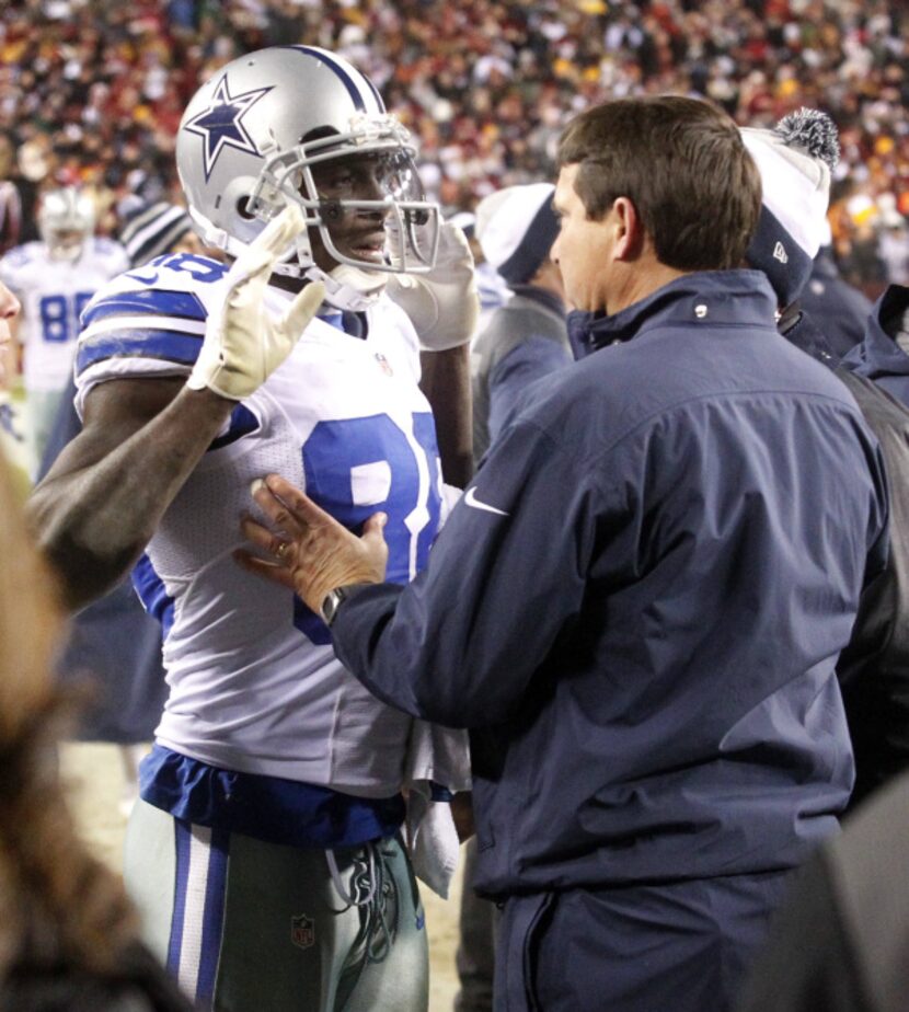 Medical staff check out Dallas Cowboys wide receiver Dez Bryant (88) after he got injured...