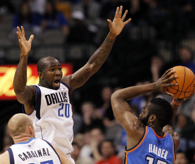 Dallas Mavericks shooting guard Dominique Jones (20) attempts to distract Oklahoma City...