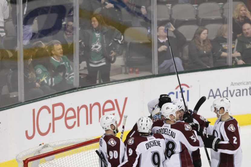 Colorado Avalanche players celebrate their victory over Dallas Stars at American Airlines...