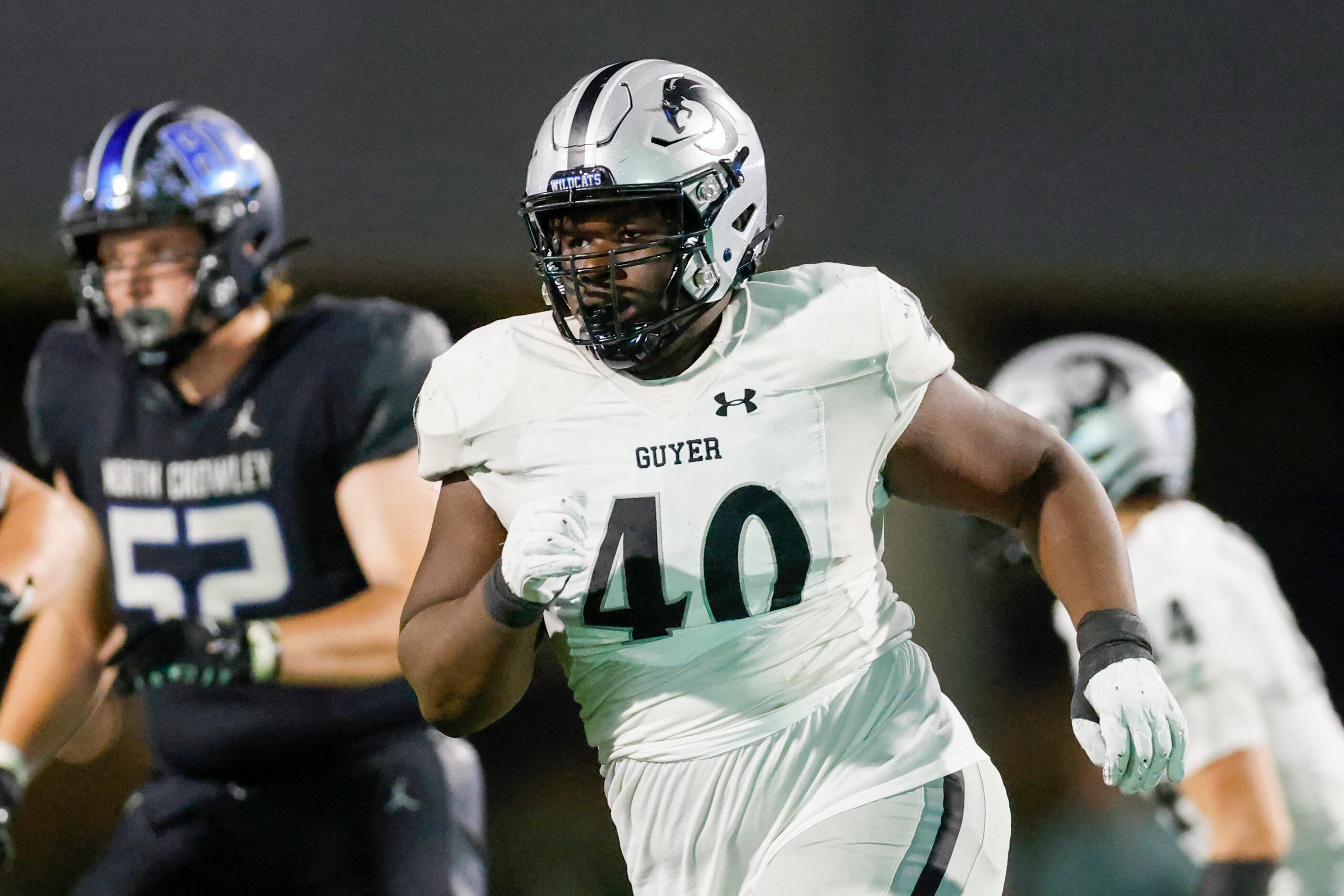 Denton Guyer defensive lineman Xavier Ukponu (40) pursues the play during the second half of...