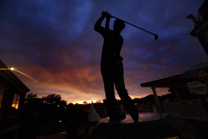After the rain had passed, a colorful sunset occurred behind the Ben Hogan statue following...