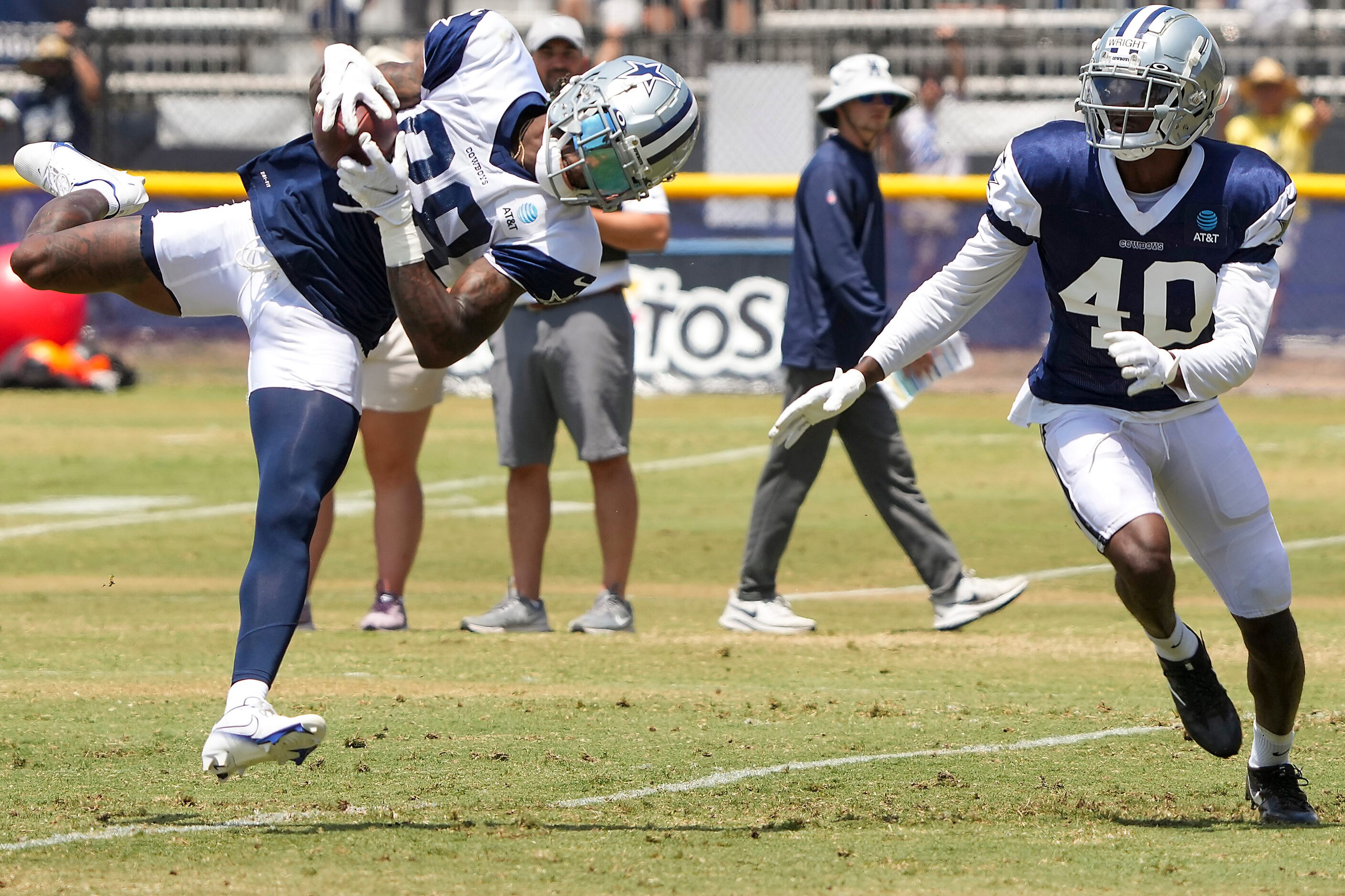 Dallas Cowboys wide receiver CeeDee Lamb (88) beats cornerback Nahshon Wright (40) on a...