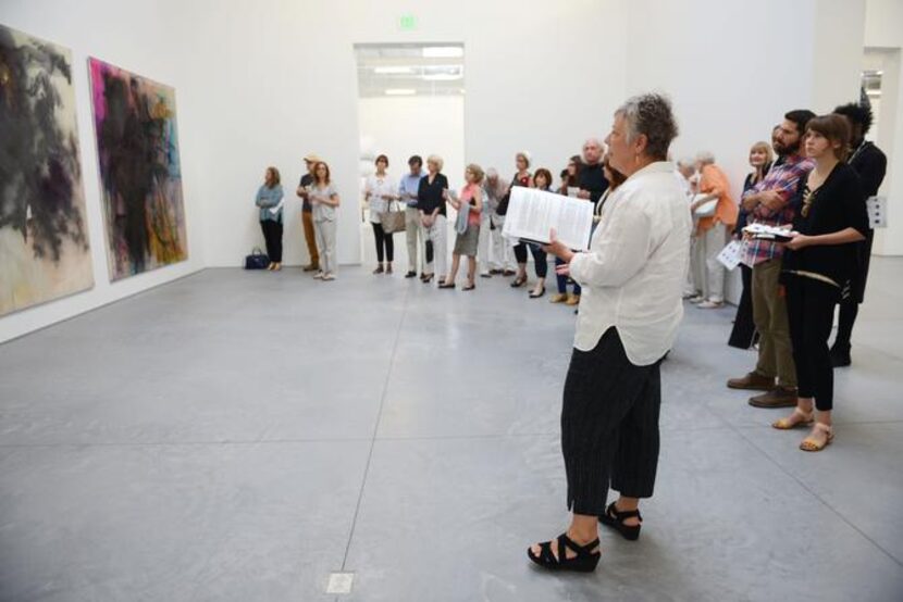 
Artist Marilyn Jolly (foreground) leads a discussion on pieces of art by Sigmar Polke...