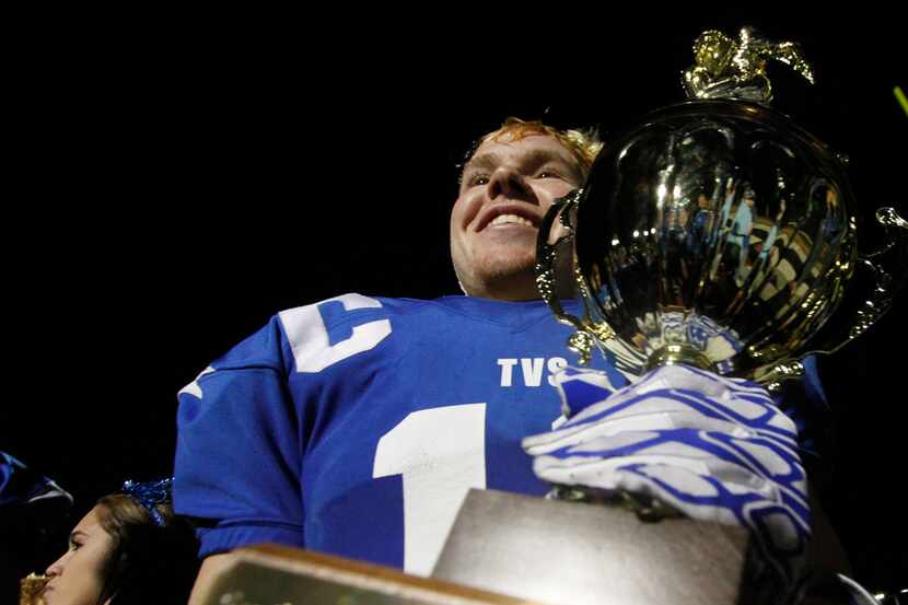 Trinity Valley's Brock Rodriguez (11) was all smiles as he held the SPC 3A Championship...