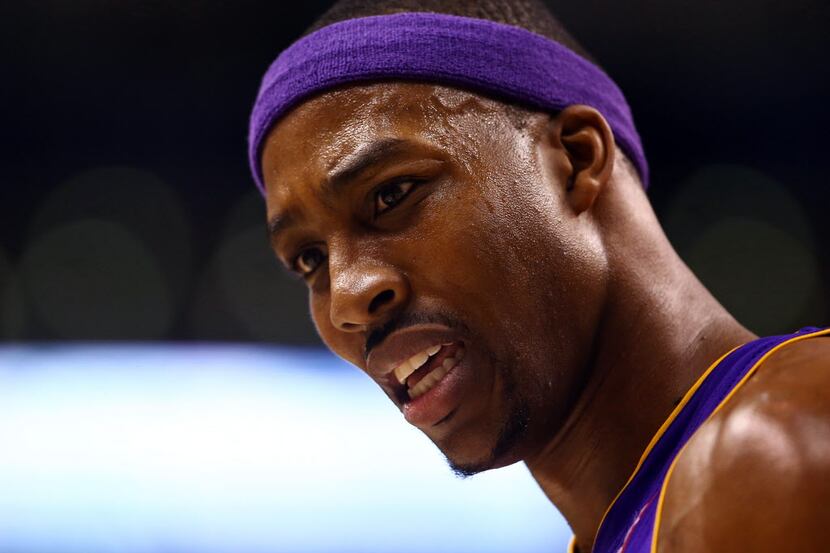 Jan 20, 2013; Toronto, ON, Canada; Los Angeles Lakers center Dwight Howard (12) reacts to a...