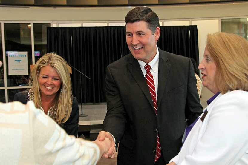 Lance Hindt greets school district employees during his days as superintendent of Allen...