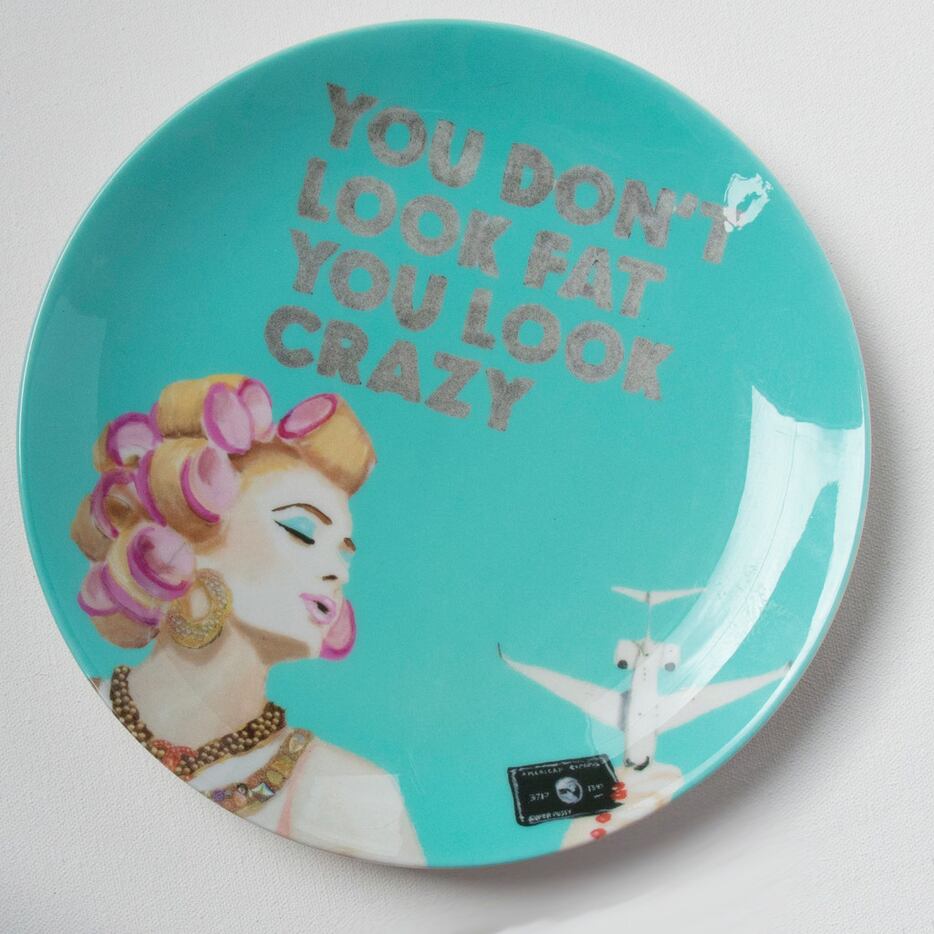 'You Don't Look Fat' plate designed by Ashley Longshore for Forty Five Ten in Dallas, $250....