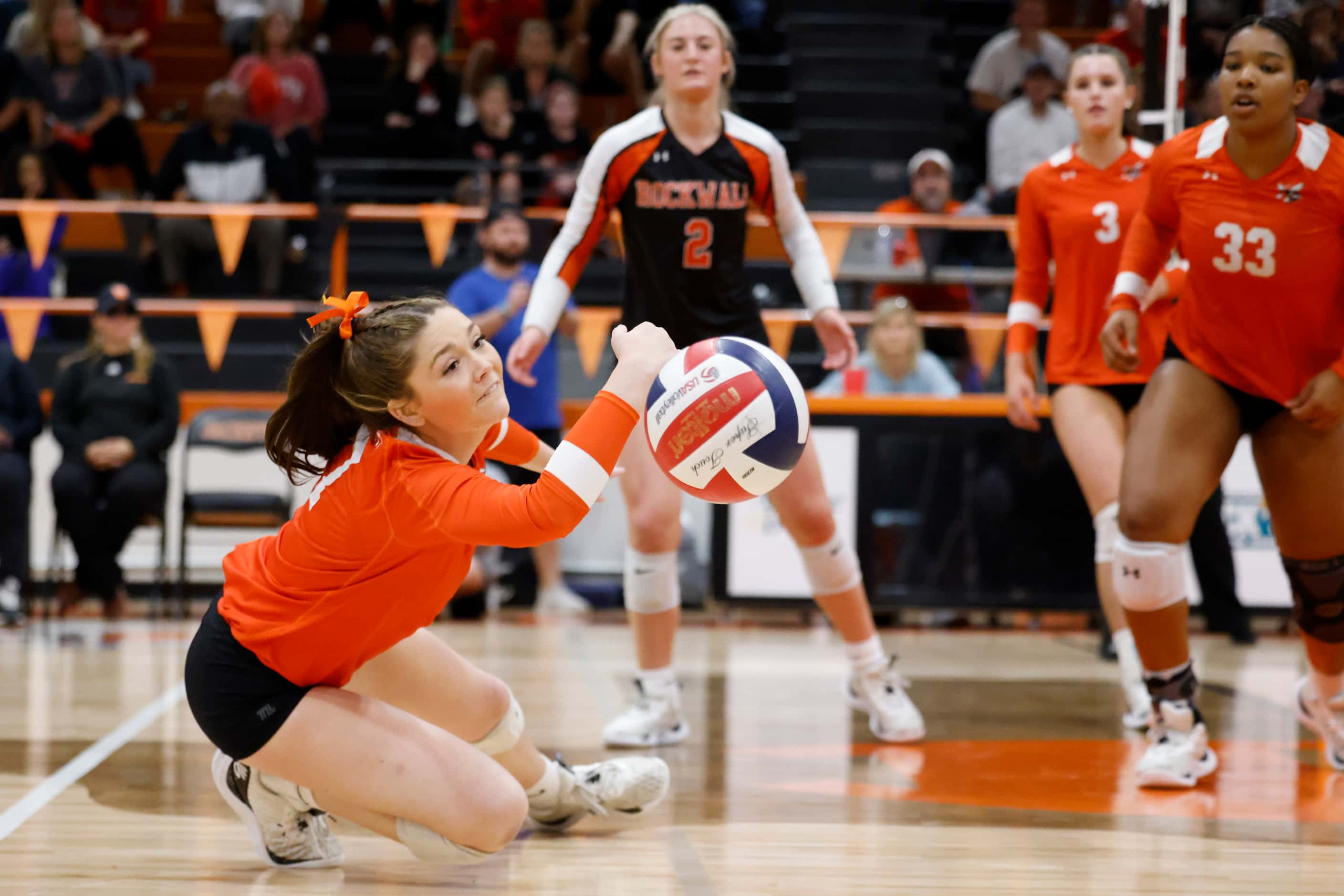 Rockwall high’s Gabi Ashcraft misses to save a point during a volleyball game against...