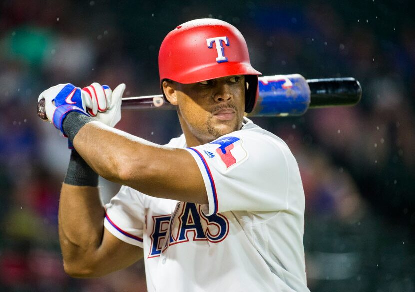 Texas Rangers third baseman Adrian Beltre (29) warms up to bat during the seventh inning of...